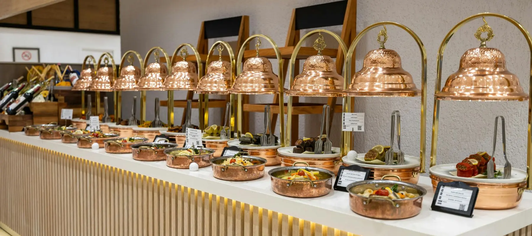 Reception Catering in Chennai - Sri Venkateswara Catering Service, Chennai — copper buffet vessels lined up at a wedding reception